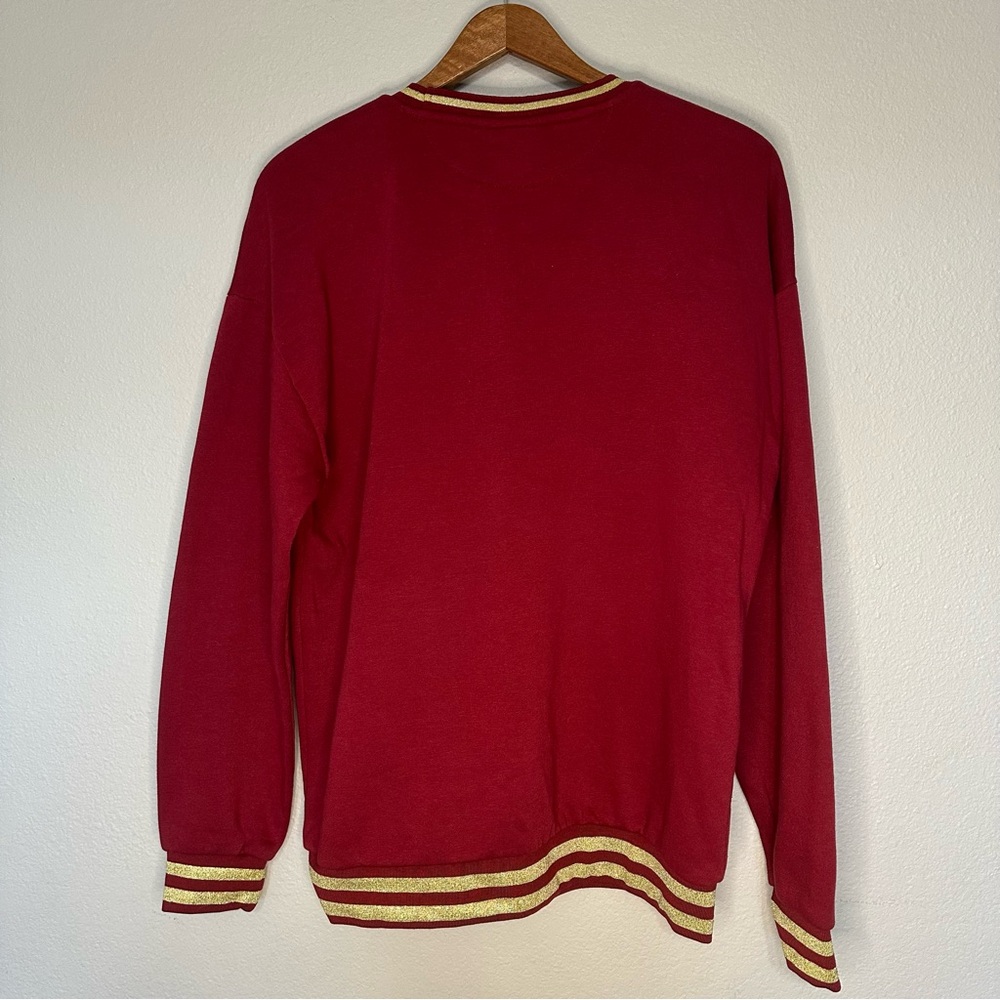 Rare Harry Potter Gryffindor Crewneck Sweater with Gold striped Hem lines SZ MD - Picture 4 of 5